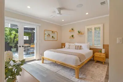 a bedroom with a bed and a window at Historic Heart of Hollywood *Newly Renovated * in Los Angeles