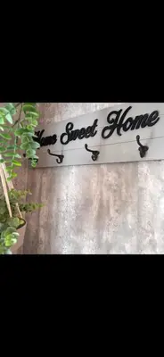 a sign with the words zone sweet home written on it at Zen Den Studio in Apple Valley