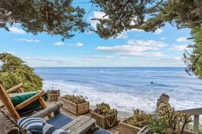a view of the ocean from a house at Private Malibu Escape - Walk to Secluded Beach in Malibu