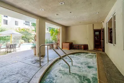 a jacuzzi tub in the middle of a house at Westwood UCLA 2BR, 1BA Cozy Condo w Amenities in Los Angeles