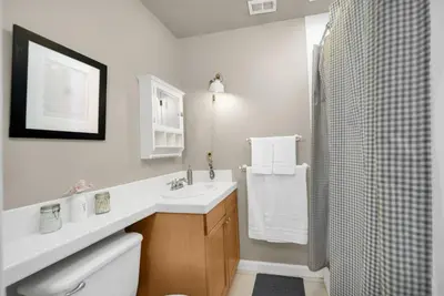 a bathroom with a sink and a toilet and a shower at Atwater Oasis with Pool and HotTub very Walkable Area in Glendale