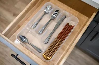 a plastic tray with utensils on a table at Modern Getaway Near Pasadena & DTLA in Rosemead