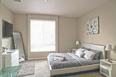a bedroom with a large bed and a window at Luxe Homestay In Venice in Los Angeles