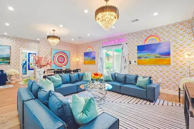 a living room with blue couches and a table at G- Luxe NoHo Family Home near Universal 15m and Hollywood 10m in Hewitt