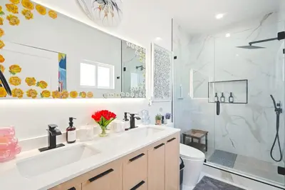 a bathroom with a sink and a shower at G- Luxe NoHo Family Home near Universal 15m and Hollywood 10m in Hewitt