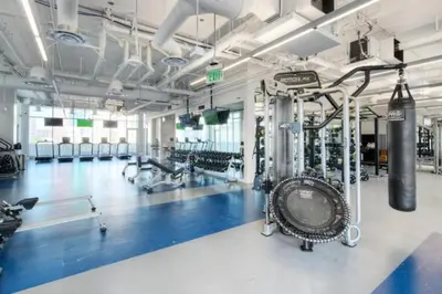 a fitness room with a gym with machines at 2 Bed 2 Bath Stylish Luxury Premium High-Rise Apartment in Los Angeles