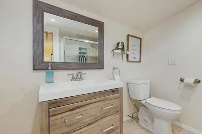 a bathroom with a sink and a toilet at Elevation Escape in Lake Arrowhead