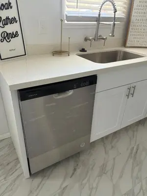 a dishwasher in a kitchen next to a sink at Serene Lakefront Escape in LA in Lake Hughes