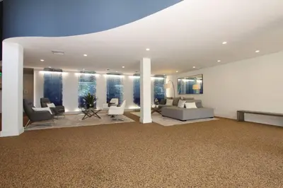 a living room with couches and chairs in a room at Prime Stays - Suite Elegance by MDR Marina & Venice - Pool, Hot Tub, Gym in Los Angeles