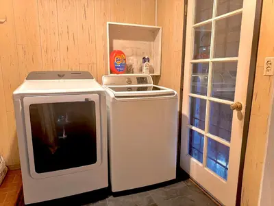 a kitchen with a stove and a microwave at West LA - Family House & Private Yard - 10 mins from LAX & Beach in Los Angeles