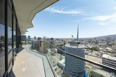 a view of a city from a building at Seven Mile Penthouse Dream Hollywood View Pool in Los Angeles