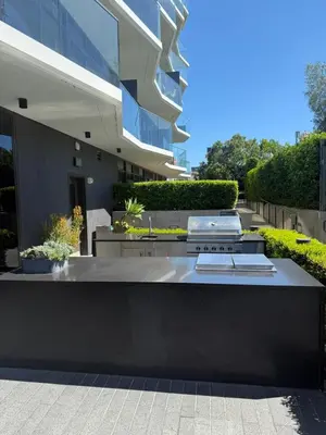 a building with a table in front of it at Seven Mile Penthouse Dream Hollywood View Pool in Los Angeles