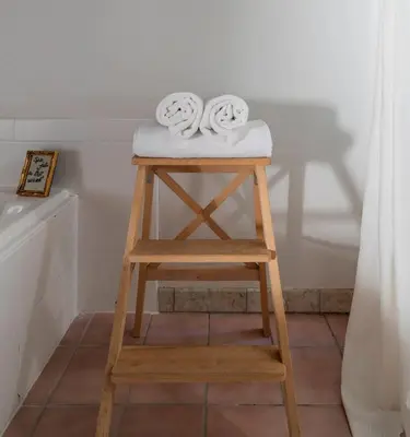 a wooden stool with towels on top of it at Malibu Villa with Beach Access and Ocean View in Malibu