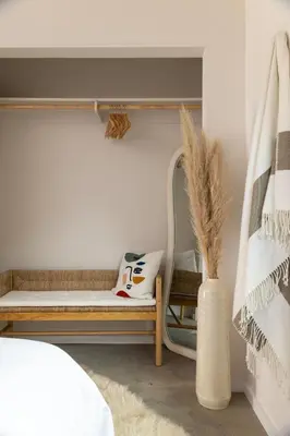 a room with a bench and a mirror at Luxe 2BR with Designer Touches, Walk to Everything in Los Angeles