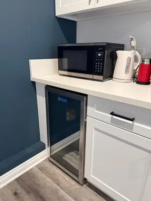 a microwave sitting on top of a kitchen counter at Guesthouse in Hewitt