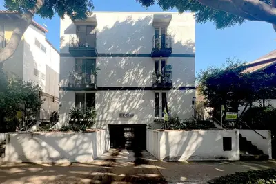 a white building with a door in front of it at Charming 1BR in Prime Santa Monica Walk to Beach in Los Angeles