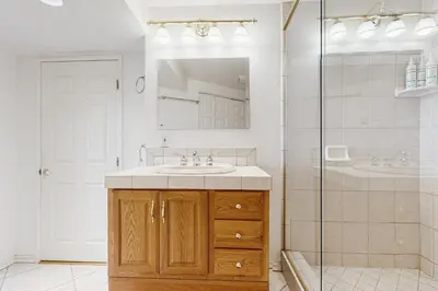 a bathroom with a sink and a shower at Bright Moon in Lake Arrowhead