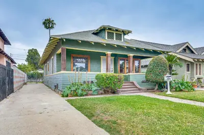 a house with a green house at 2 Mi to USC Central Home in Los Angeles! in Los Angeles