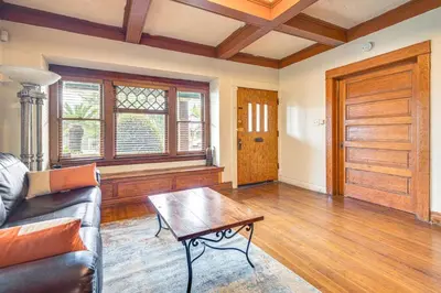 a living room with a couch and a coffee table at 2 Mi to USC Central Home in Los Angeles! in Los Angeles