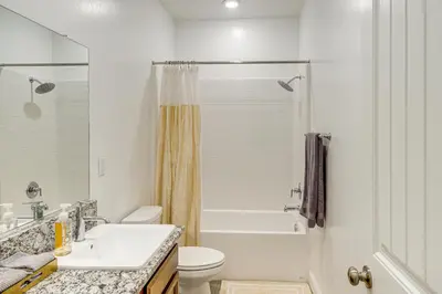 a bathroom with a sink and a toilet and a shower at 9 Mi to Dtwn Bakersfield Pet-Friendly Home in Bakersfield