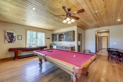 a pool table in a room with a ceiling at Walkable Big Bear Lake Home with Private Hot Tub! in Big Bear Lake