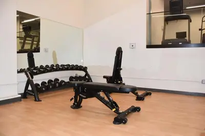 a gym with a black exercise bike in a room at Stylish LA studio Prime Location in Los Angeles
