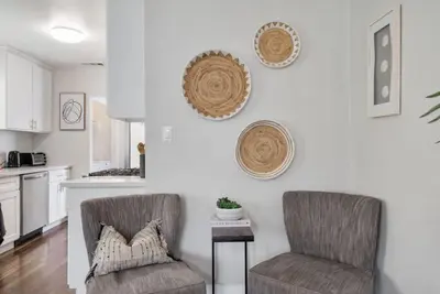 two chairs and a table in a kitchen at Travel Haven - Great Location - Quiet Area in Long Beach