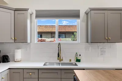 a kitchen with a sink and a window at Contemporary Retreat Hollywood & DTLA in Los Angeles