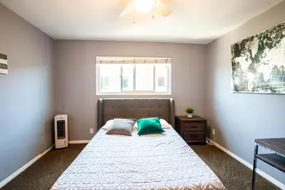 a bedroom with a bed and a window at Renovated Culver City Escape Walkable WFH in Los Angeles