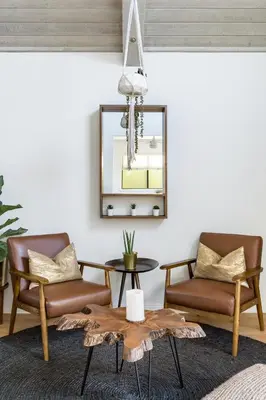 a living room with two chairs and a table at Silver Triangle Oasis with Verdant Backyard in Los Angeles