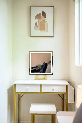 a desk with a mirror on top of it at 1 Block to Beach Heaven Chic 2BD in Manhattan Beach