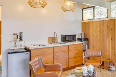 a kitchen with a sink and a counter top at Stroll to Beach and Pepperdine Airy Malibu Studio in Malibu