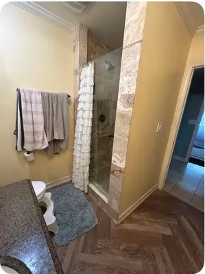 a bathroom with a shower and a toilet at Glamping Cabin Tent Heated View Deck 2Acre Estate - Female Share Indoor - Men Share Outdoor - RG in Encino