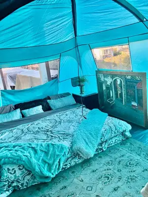 a bedroom with a blue tent with a bed at Glamping Cabin Tent Heated View Deck 2Acre Estate - Female Share Indoor - Men Share Outdoor - RG in Encino