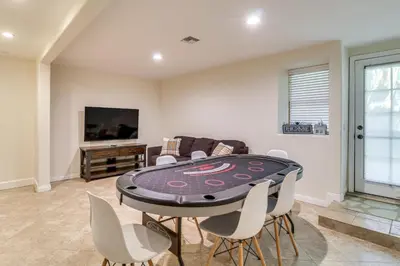 a dining room with a table and chairs at Play, Swim and Unwind Luxe Los Angeles Oasis! in Chatsworth Lake Manor