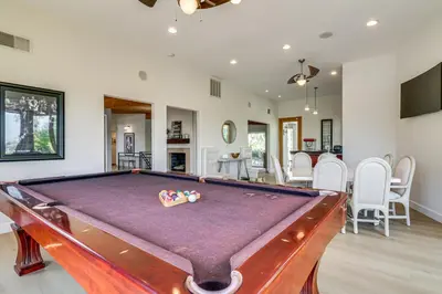 a pool table in the middle of a living room at Play, Swim and Unwind Luxe Los Angeles Oasis! in Chatsworth Lake Manor