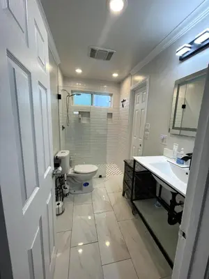 a bathroom with a toilet and a sink and a shower at House in Redondo Beach 2 bedroom 1 bath in Redondo Beach