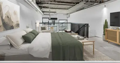 a bedroom with a large bed and a living room at Loft & Luxe Hollywood with FREE PARKING in Los Angeles