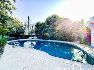 a small swimming pool in a yard with trees at 6BR Pool Escape for Friends and Family - LOU1 - BUR in Burbank