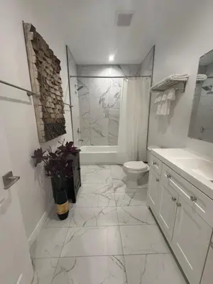 a bathroom with a toilet and a shower and a sink at Stunning Guest House in West Hills California in Hughes-Canoga Park Heliport