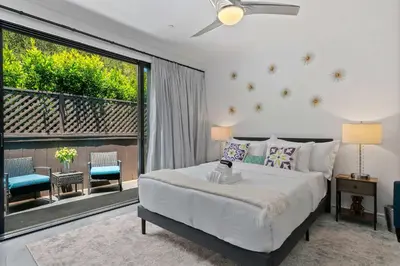 a bedroom with a bed and a large window at New Listing Burbank Bungalow by Colby&Conrad in Los Angeles