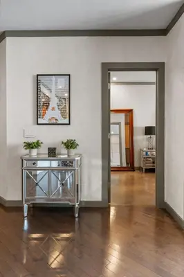 a room with a table with potted plants on it at Stylish Westwood Condo, Near UCLA & Century City in Los Angeles