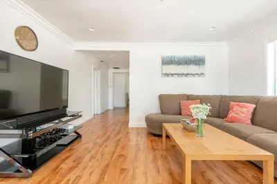 a living room with a large flat screen tv at Ideal 4BR2BA Home for Family Vacations in Alhambra