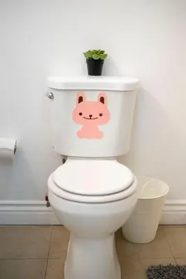 a toilet with a pink hello kitty sticker on it at Cozy 2BR2BA Guest House in Alhambra in Alhambra