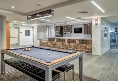 a pool table in the middle of a room at Marina Escape 2BR Townhouse with FREE PARKING in Los Angeles