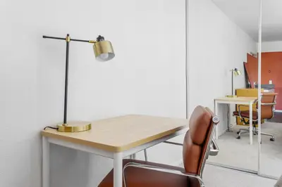an office with a desk with a lamp and a chair at Blueground Hollywood Hills jacuzzi nr Runyon Canyon LAX-1380 in Los Angeles