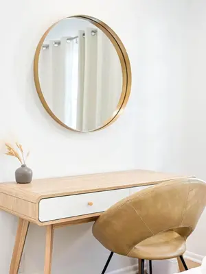 a mirror sitting on top of a desk with a chair at Cozy Boho 2BR Near Beverly Hills - DOH2 - CUL in Los Angeles