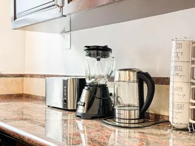 a blender sitting on a counter in a kitchen at Cozy Boho 2BR Near Beverly Hills - DOH2 - CUL in Los Angeles