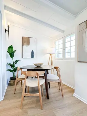 a dining room with a table and chairs at Cozy Boho 2BR Near Beverly Hills - DOH2 - CUL in Los Angeles