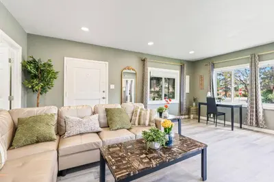 a living room with a couch and a table at Prime location King Bed! Private house1 in Alhambra